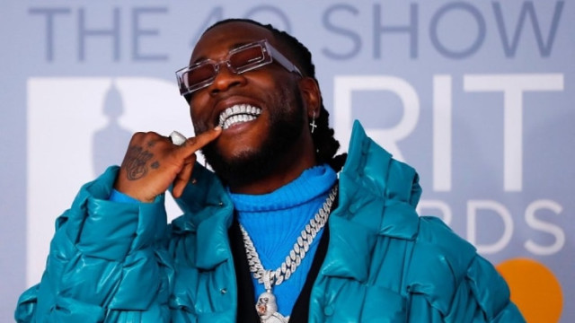 Burna Boy Receives Plaque For 2 Billion Streams in UK